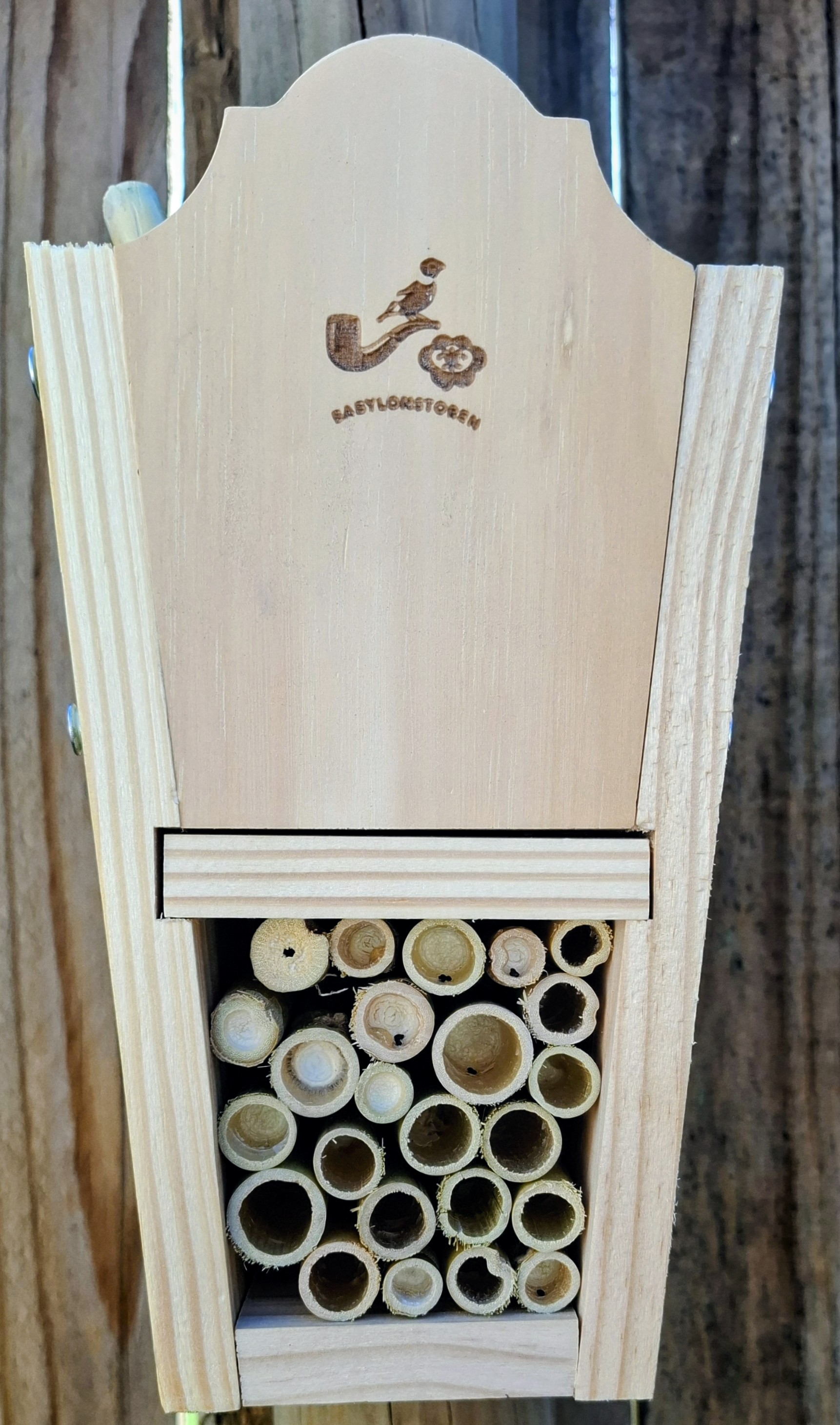 A close-up of the assembled Bug House, bamboo tubes neatly packed and ready for nesting